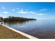 Stunning waterfront view of calm water with homes along the shoreline at 1 Colony Point Dr # A19, Punta Gorda, FL 33950