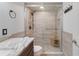 Modern bathroom with a large walk-in shower and marble countertop at 1029 Belmar Ave, Port Charlotte, FL 33948