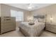 Spacious bedroom with a queen-size bed and plenty of storage at 1029 Belmar Ave, Port Charlotte, FL 33948