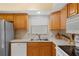 Well-equipped kitchen, featuring a dishwasher and sink at 1029 Belmar Ave, Port Charlotte, FL 33948