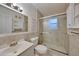 Bathroom with shower/tub combo and updated vanity at 103 Atwater St, Port Charlotte, FL 33954