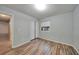 Bedroom with wood-look floors and a closet at 103 Atwater St, Port Charlotte, FL 33954