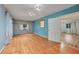 Bedroom with light blue walls and hardwood floors at 103 Atwater St, Port Charlotte, FL 33954