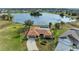 Aerial view of single-Gathering home with pool and lake access at 1115 Venture Ct, Punta Gorda, FL 33983