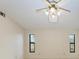 Bright bedroom with vaulted ceiling and two windows at 1115 Venture Ct, Punta Gorda, FL 33983