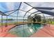 Screened pool with lake view, and spacious deck at 1115 Venture Ct, Punta Gorda, FL 33983