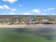 Aerial view of beach, coastline, and neighborhood at 12071 Claremont Dr, Port Charlotte, FL 33981