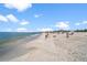 Relaxing beach with calm waters and sunny skies at 12071 Claremont Dr, Port Charlotte, FL 33981