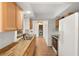 Kitchen with butcher block countertops and wood cabinets at 12071 Claremont Dr, Port Charlotte, FL 33981