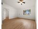 Living room with hardwood floors and view to exterior at 12071 Claremont Dr, Port Charlotte, FL 33981