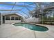 Inviting screened pool area, perfect for outdoor enjoyment at 12071 Claremont Dr, Port Charlotte, FL 33981