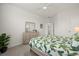 Bedroom with leafy bedding and ceiling fan at 14150 Poppy Field Loop # 4322, Punta Gorda, FL 33955