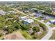 Aerial view showcasing home's location in a residential neighborhood at 14303 Maysville Cir, Port Charlotte, FL 33981