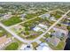 Bird's eye view of a house and surrounding neighborhood at 14303 Maysville Cir, Port Charlotte, FL 33981