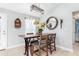 Small dining area with a wooden table and chairs at 14303 Maysville Cir, Port Charlotte, FL 33981