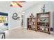 Hallway with rustic wooden shelving and wall art at 14303 Maysville Cir, Port Charlotte, FL 33981