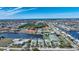 Wide aerial showcasing the community's location near the water at 1431 Aqui Esta Dr # 221, Punta Gorda, FL 33950