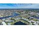 Stunning aerial view of waterfront homes and boat slips at 1431 Aqui Esta Dr # 221, Punta Gorda, FL 33950