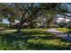 Aerial view of a community with mature trees and winding paths at 1447 Red Oak Ln, Port Charlotte, FL 33948