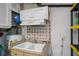 Utility sink with cabinets in the garage at 1447 Red Oak Ln, Port Charlotte, FL 33948