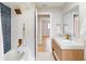 Bathroom with herringbone tile and modern vanity at 1612 Nuremberg Blvd, Punta Gorda, FL 33983