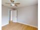 Bright bedroom with ceiling fan and hardwood floors at 1612 Nuremberg Blvd, Punta Gorda, FL 33983