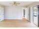 Bedroom with wood floors, sliding door and view at 1612 Nuremberg Blvd, Punta Gorda, FL 33983