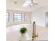 Modern kitchen features marble countertops and gold faucet at 1612 Nuremberg Blvd, Punta Gorda, FL 33983