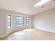 Light-filled living room featuring hardwood floors and skylight at 1612 Nuremberg Blvd, Punta Gorda, FL 33983