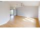 Light and airy living room featuring light hardwood floors and neutral walls at 1612 Nuremberg Blvd, Punta Gorda, FL 33983