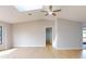 Open living room with hardwood floors and a view to other rooms at 1612 Nuremberg Blvd, Punta Gorda, FL 33983