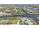 This waterfront property boasts stunning canal and ocean views at 18138 Eau Gallie Cir, Port Charlotte, FL 33948