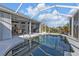 Large screened-in pool area perfect for entertaining and relaxation at 18138 Eau Gallie Cir, Port Charlotte, FL 33948