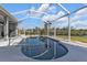 Relax by the refreshing pool, screened in with gorgeous water views at 18138 Eau Gallie Cir, Port Charlotte, FL 33948