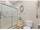 Clean bathroom featuring a shower and a toilet at 2110 Royal Tern Cir, Punta Gorda, FL 33983