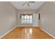 Spacious bedroom featuring hardwood floors and window at 2110 Royal Tern Cir, Punta Gorda, FL 33983