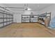 Garage with overhead storage shelving at 2110 Royal Tern Cir, Punta Gorda, FL 33983