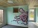 Bonus room with painted octopus mural and access to the backyard at 2115 Myrtle Ave, Punta Gorda, FL 33950