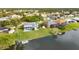 Aerial view of house and waterfront lot at 22259 Priscilla Ave, Port Charlotte, FL 33954