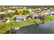 Home located on a canal with a backyard pool and shed at 22259 Priscilla Ave, Port Charlotte, FL 33954