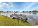 Private dock with boat and lake views at 22259 Priscilla Ave, Port Charlotte, FL 33954