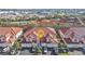 Aerial view of a community of townhouses with red tile roofs and attached garages at 240 W End Dr # 412, Punta Gorda, FL 33950