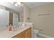 Bathroom with sink, toilet and mirror at 240 W End Dr # 412, Punta Gorda, FL 33950