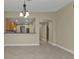 Dining room with tile floor and kitchen pass-through at 240 W End Dr # 412, Punta Gorda, FL 33950