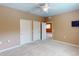 Bright bedroom featuring double closets and neutral color palette at 24067 Park Place S Dr # 71, Port Charlotte, FL 33980