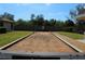 Community bocce ball court with a view of the surrounding neighborhood at 24067 Park Place S Dr # 71, Port Charlotte, FL 33980