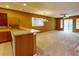 Bright dining room with chandelier and view of kitchen at 24067 Park Place S Dr # 71, Punta Gorda, FL 33980