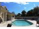 Inviting community pool and spa with plenty of lounge chairs at 24067 Park Place S Dr # 71, Port Charlotte, FL 33980