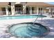 Community spa adjacent to the refreshing swimming pool at 24067 Park Place S Dr # 71, Punta Gorda, FL 33980