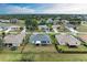 Aerial view of a house and surrounding neighborhood, showcasing the property's location and setting at 2467 Odessa Ln, Punta Gorda, FL 33983